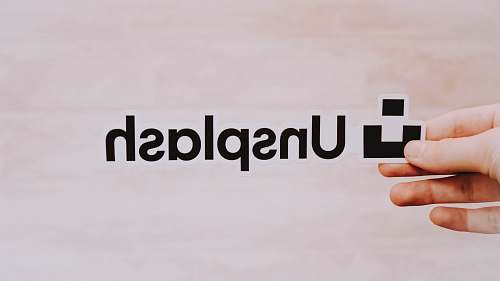human Unsplash logo hand