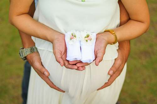 finger woman wearing white dress diaper