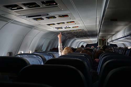 transportation woman raising her hand on passenger seat travel