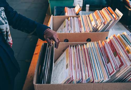 music person touching book box shopping