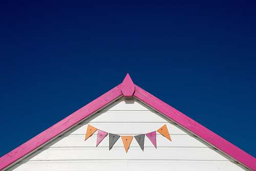  white and pink wooden house roof 