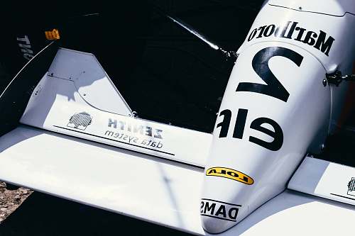 aircraft white Marlboro 2 Elf Formula 1 racing car transportation