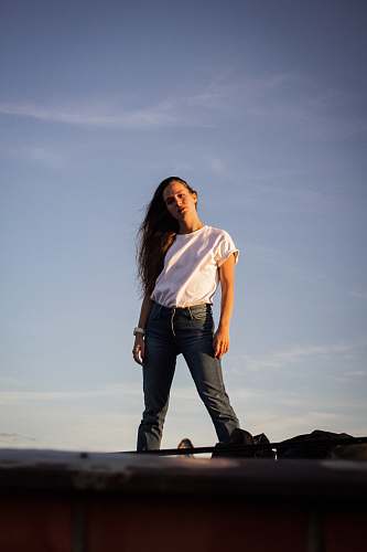 clothing standing woman in white shirt pants