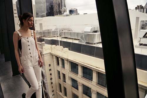 clothing woman wearing white denim overalls human