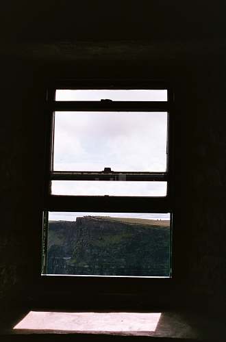 building close-up photo of windowpane window