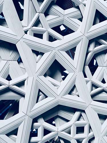 triangle closeup photo of white decor building