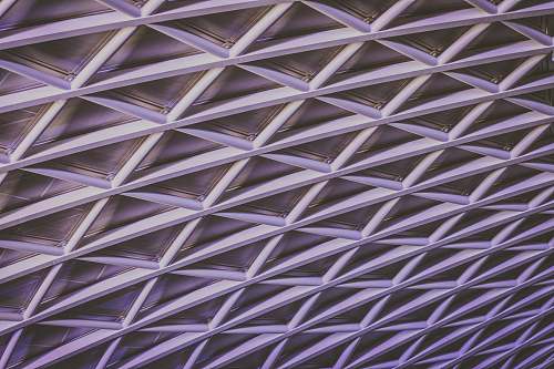 london Latticework of support beams in a ceiling pattern