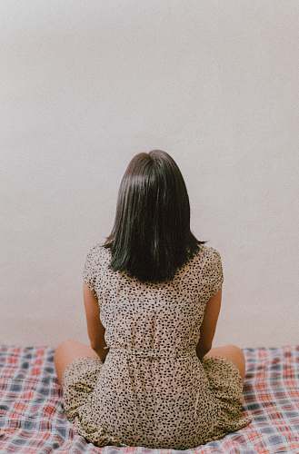 tepic woman sitting on bed mexico