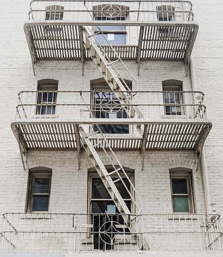 handrail brown concrete building railing