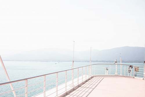 handrail cruise ship on body of water railing