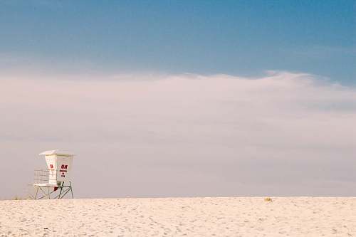 minimal white shed under blue sky sky