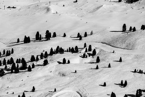 outdoors aerial photo of mountain covered in snow snow