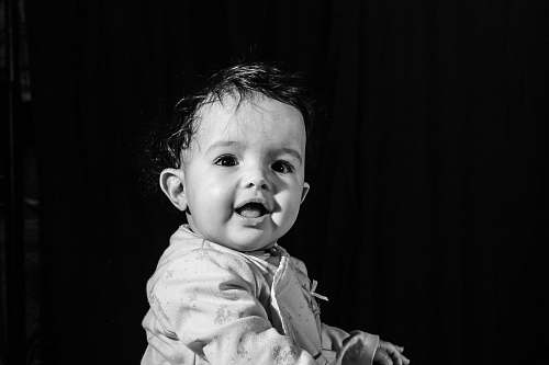 person black and white photo of toddler people