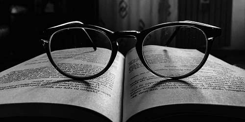 glasses black frame eyeglasses on book accessories