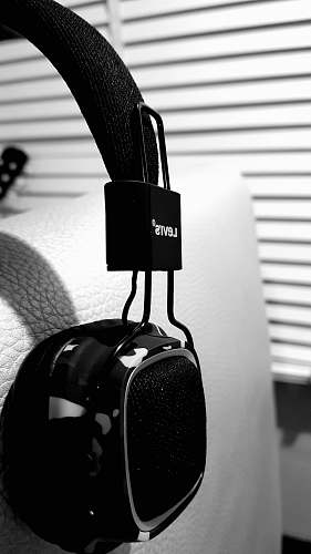 electronics black headphones on gray sofa headphones