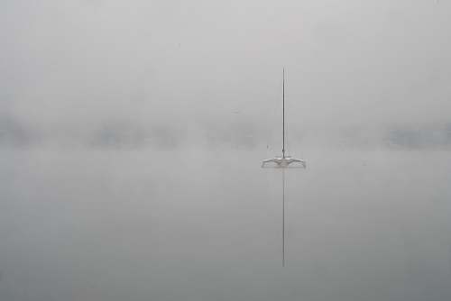 grey black metal rod background of open field sailboat