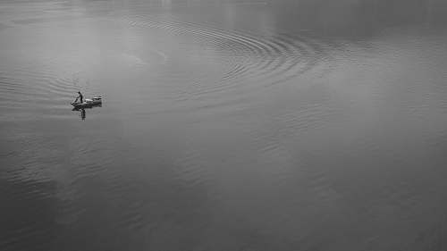 outdoors boat floating on water grey
