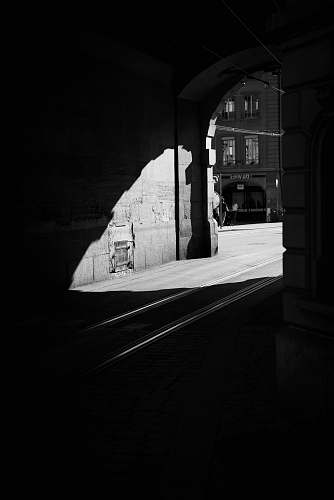 human gray paved road person