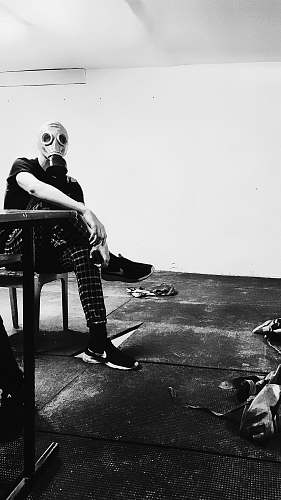 apparel gray scale photo of person wearing gasmask clothing