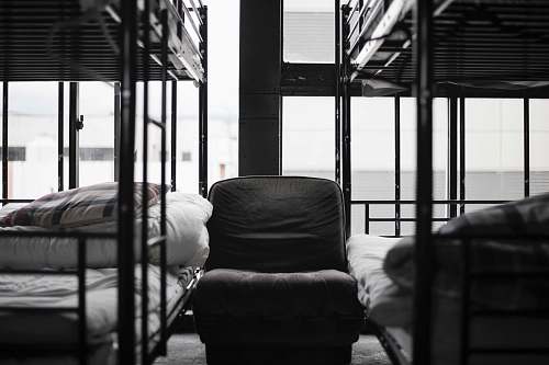 furniture grayscale photo of bunk bed and chair building