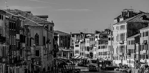 grey grayscale photo of concrete structures human