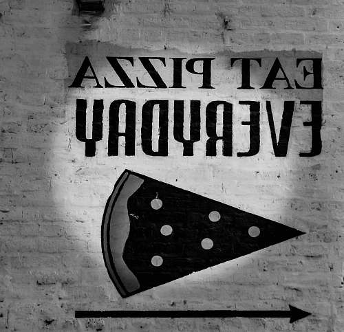 chicago grayscale photo of eat pizza everyday signage pizza