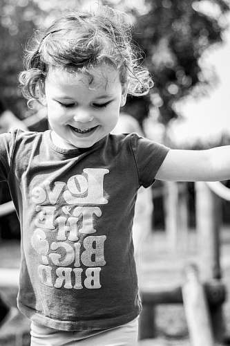 clothing grayscale photo of girl in t-shirt apparel