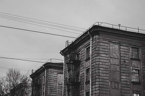 building grayscale photo of houses urban