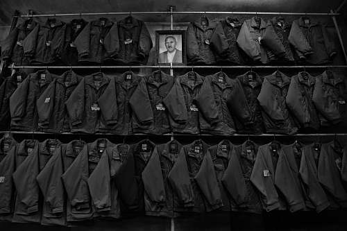 clothing grayscale photo of jackets and a photo frame apparel