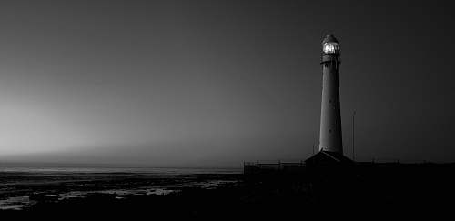 architecture grayscale photo of lighthouse building