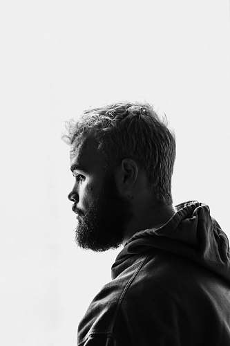 human grayscale photo of man facing right face