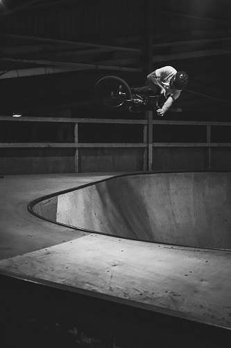 bike grayscale photo of person riding BMX bike bmx