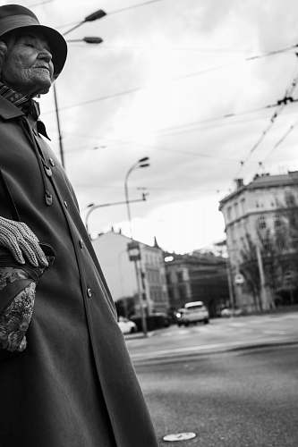 apparel grayscale photo of woman standing clothing