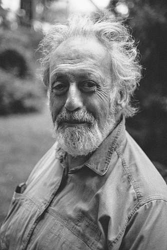 grey grayscale photograph of man's portrait face