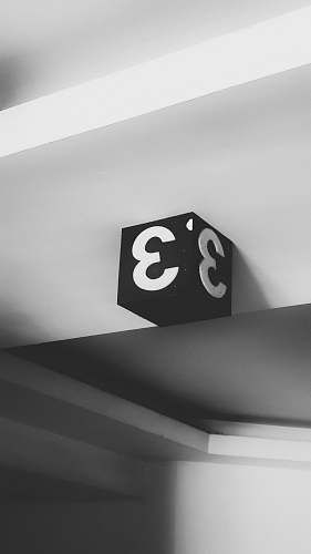 symbol grayscale photography of 3 signage text