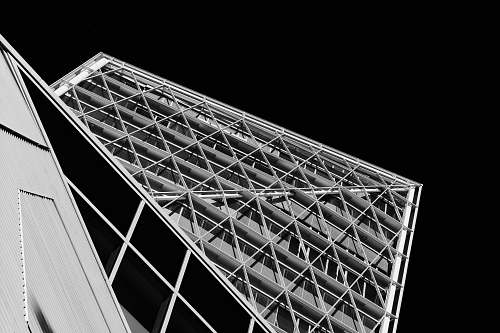 architecture grayscale photography of building triangle