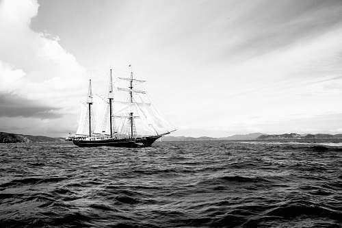 transportation grayscale photography of galleon ship on waters vessel