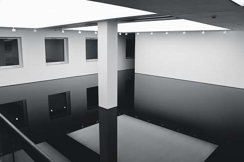 grey grayscale photography of inside building view lighting
