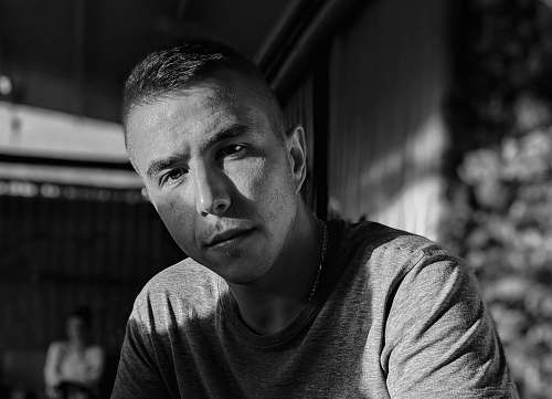 person grayscale photography of man human