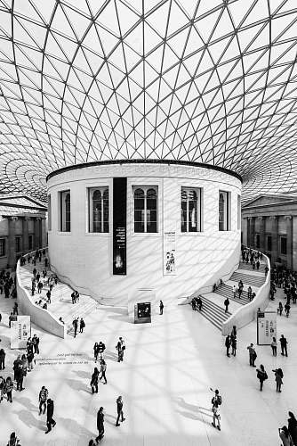 london grayscale photography of people inside building british museum