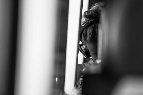 dronten grayscale photography of person wearing headphones netherlands