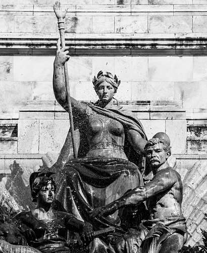 bordeaux grayscale photography of toile water fountain sculpture