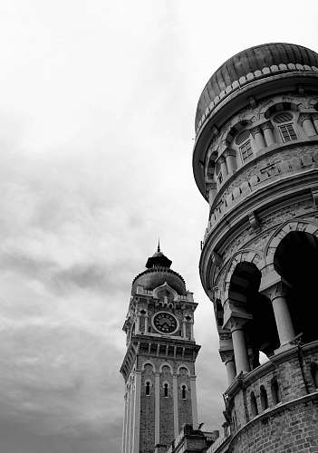 architecture grayscale photography of towers building