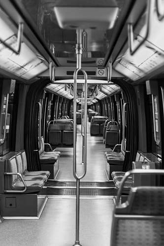 terminal grayscale photography of train interior train