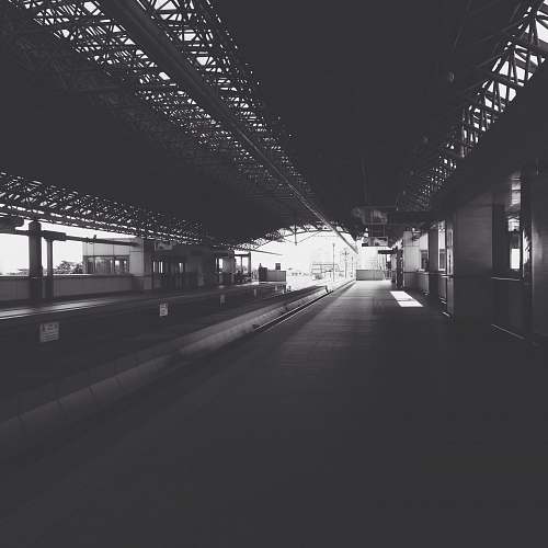 empty grayscale photography of train railway train