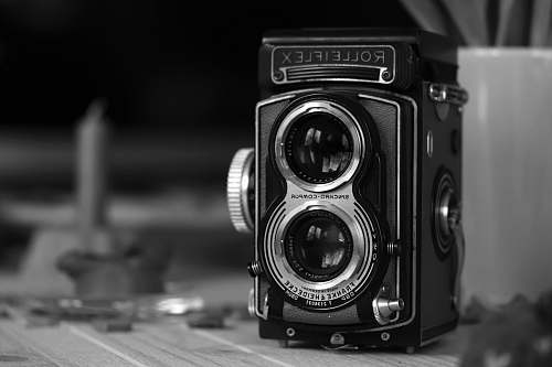 camera grayscale photography of vintage black camera electronics