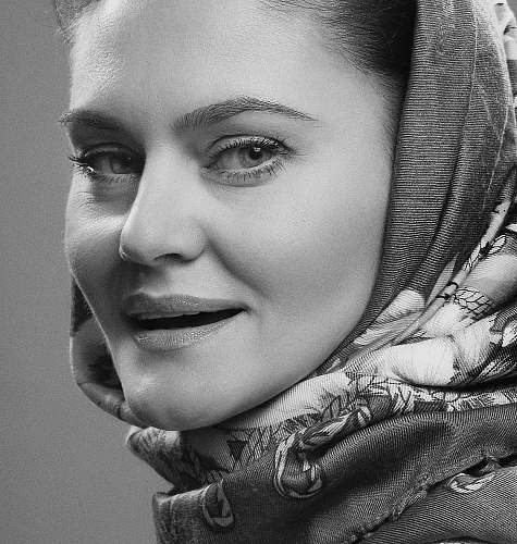 apparel grayscale photography of woman wearing hijab clothing