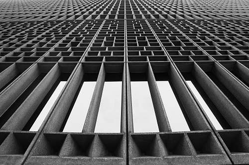 railing low angle photography of high rise building staircase