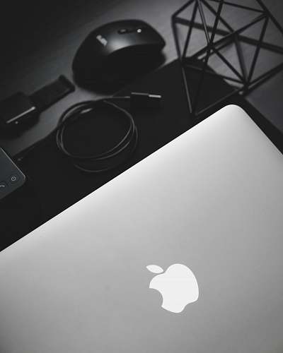 mouse MacBook near black computer mouse logo