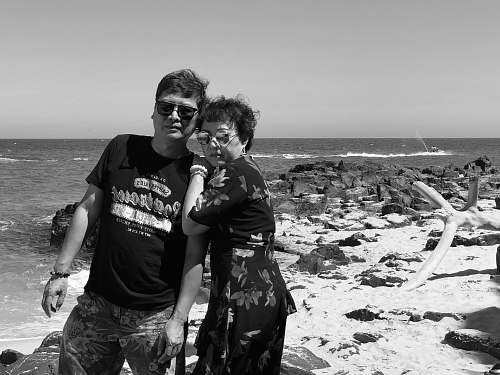 nature man and woman near ocean ocean